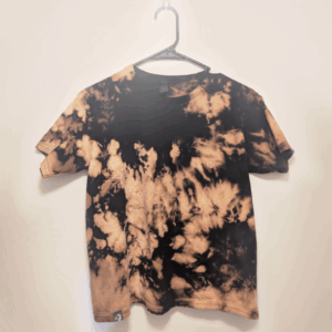 Black kids tee shirt with hand-bleached nebula design in the center