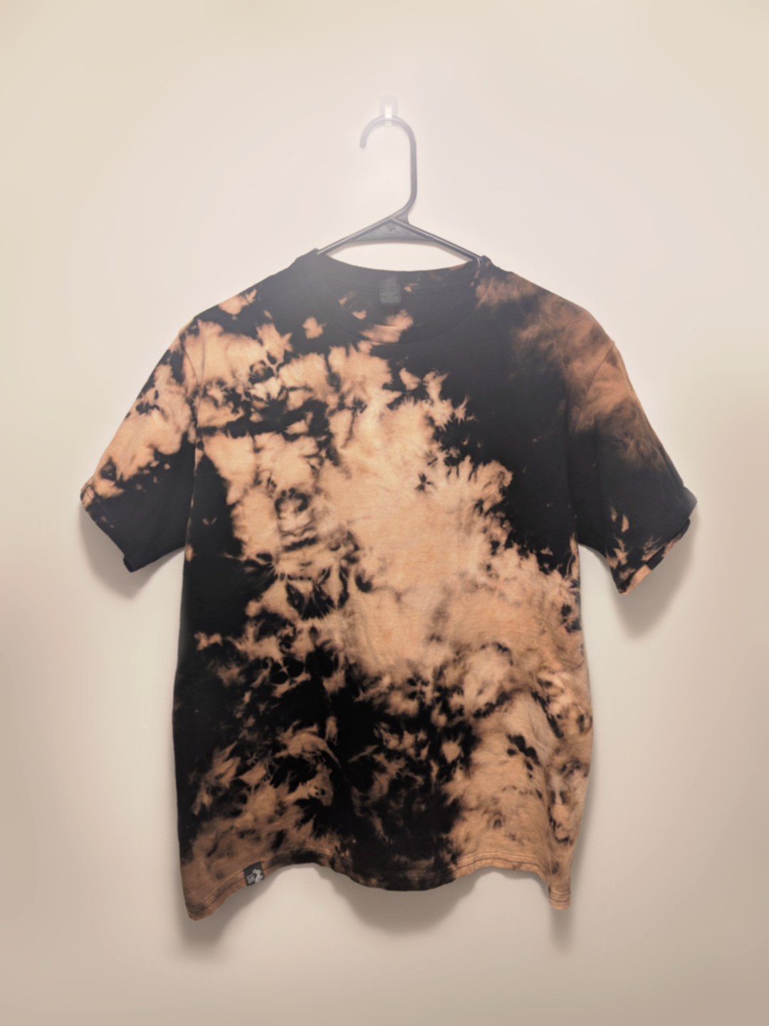 Black kids tee shirt with hand-bleached nebula design in the center