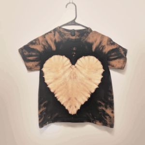 Black kids tee shirt with hand-bleached heart design in the center