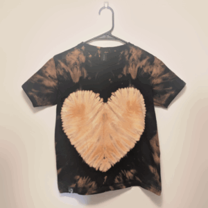Black kids tee shirt with hand-bleached heart design in the center