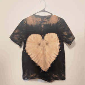 Black kids tee shirt with hand-bleached heart design in the center