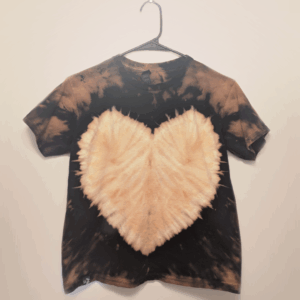 Black kids tee shirt with hand-bleached heart design in the center