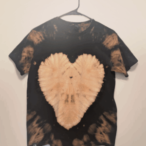Black kids tee shirt with hand-bleached heart design in the center